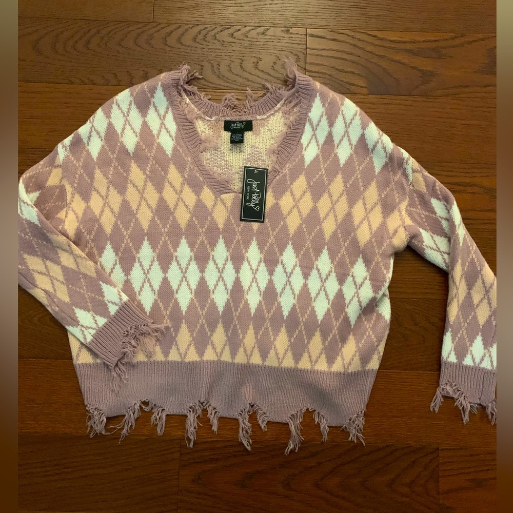 Sweater size small . New with tags .